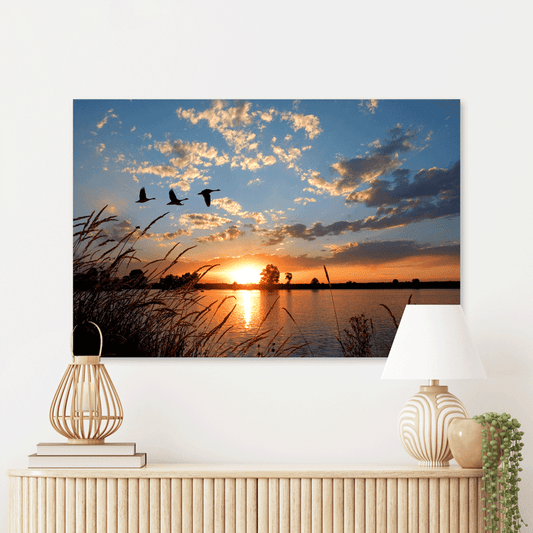 Schilderij Ganzen bij Zonsondergang