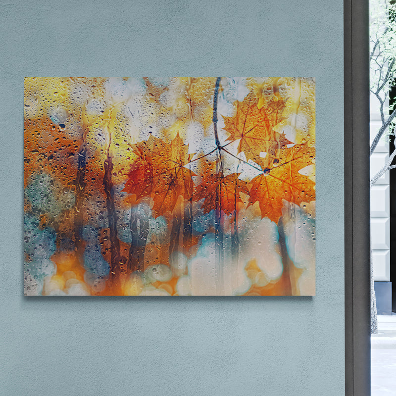 Schilderij Herfstbladeren achter regenachtig glas