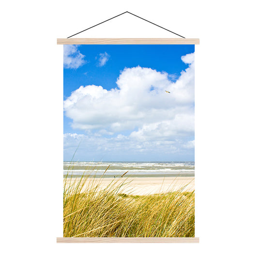 Textielposter aan de Noordzee